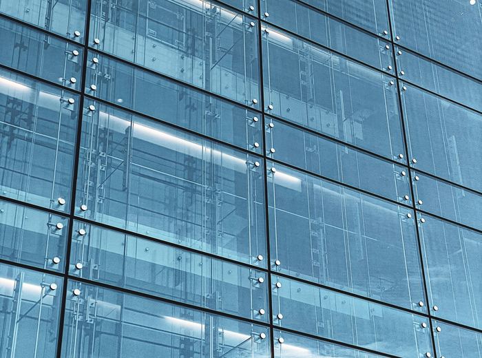 Point-fixed glass facade fitting